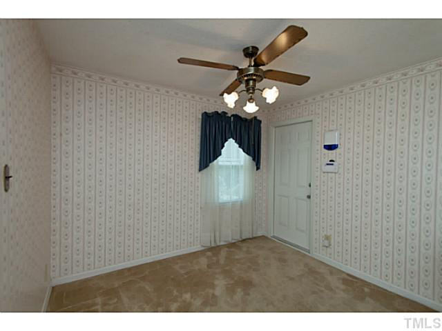 2468 Milburnie Road Raleigh, NC 27610 - Photo 9 of 25 a view of an empty room