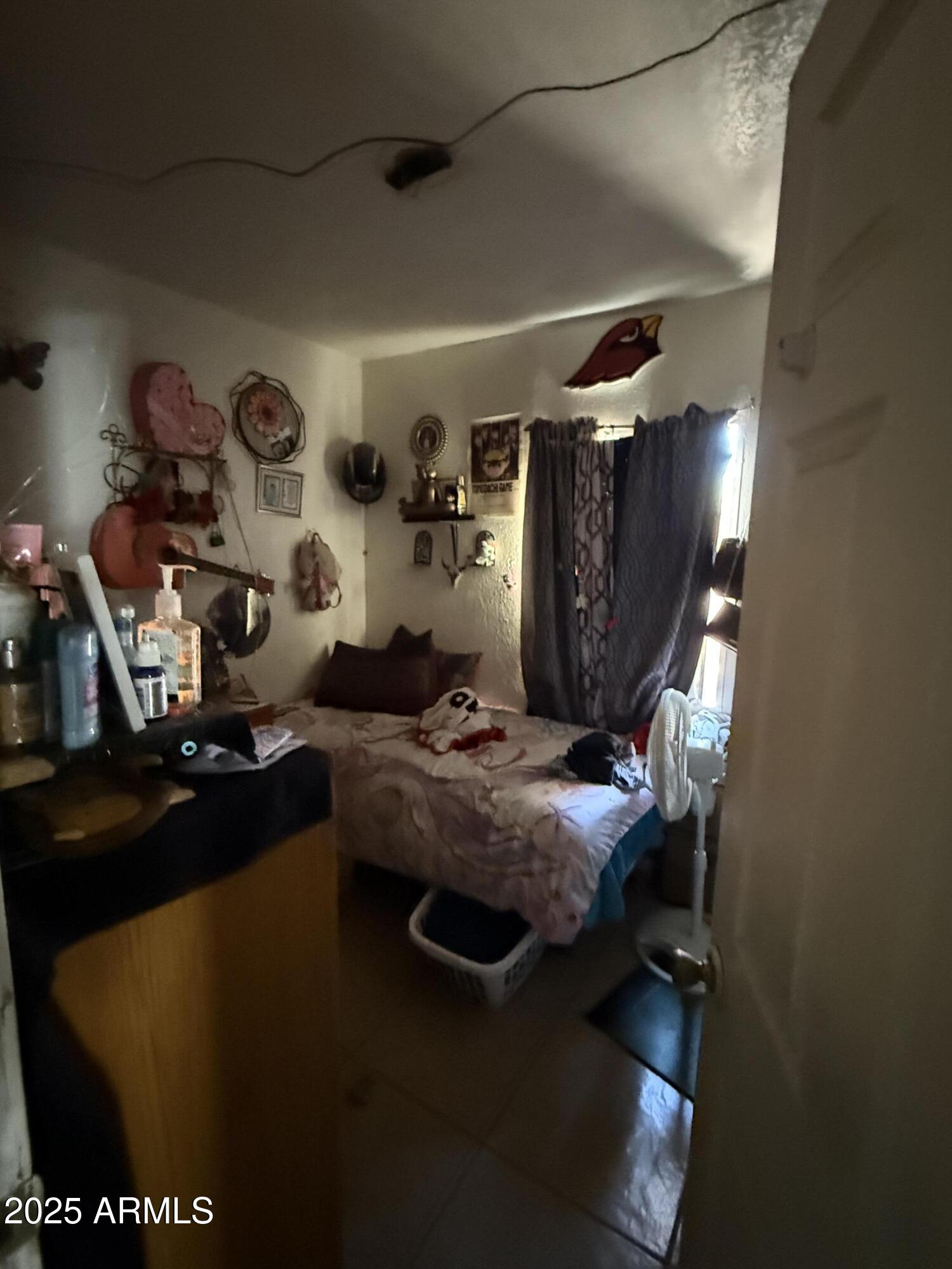 3206 West Pierce Street Phoenix, AZ 85009 - Photo 7 of 12 a living room with furniture