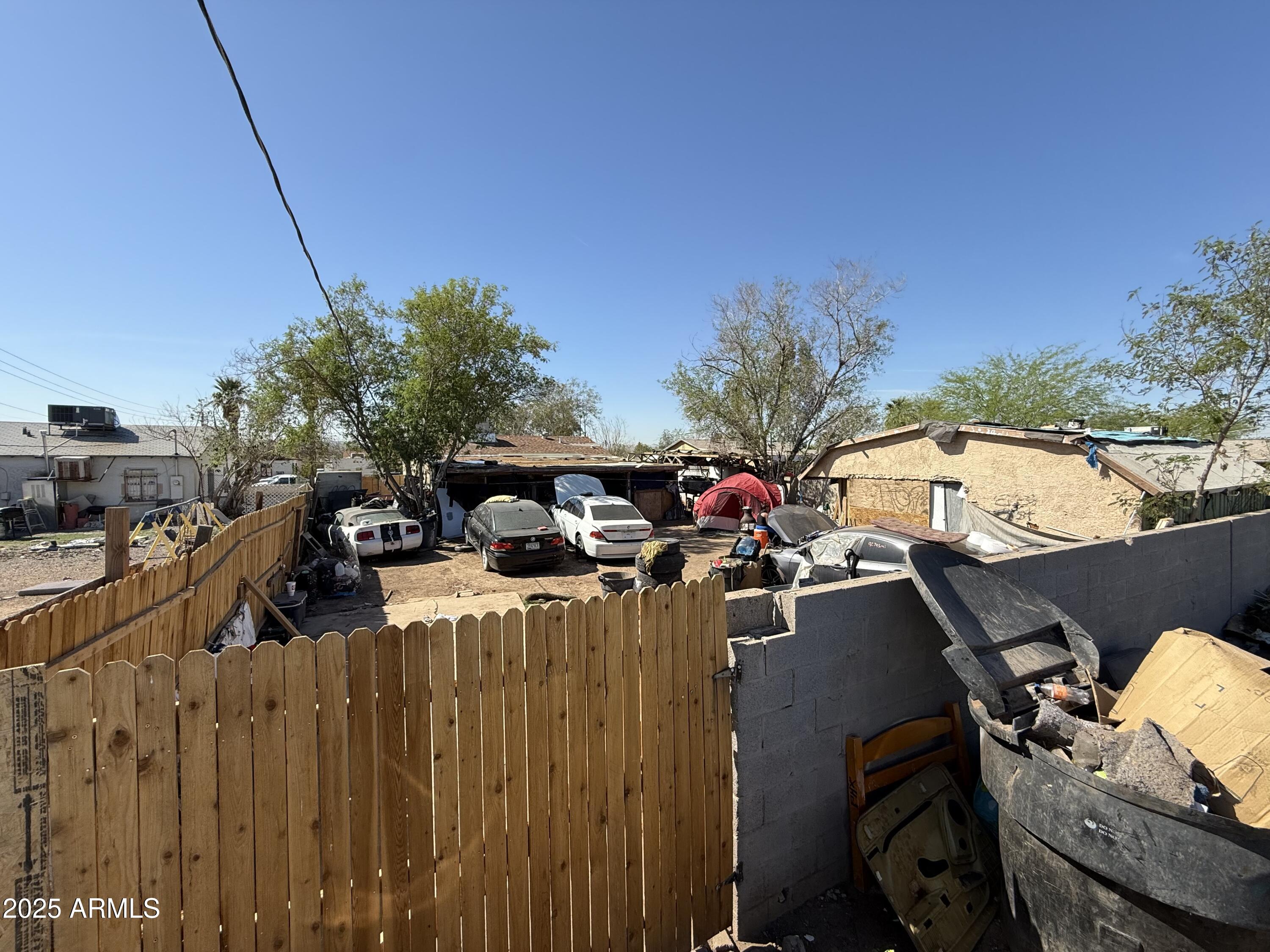3206 West Pierce Street Phoenix, AZ 85009 - Photo 10 of 12 a view of a balcony with chairs