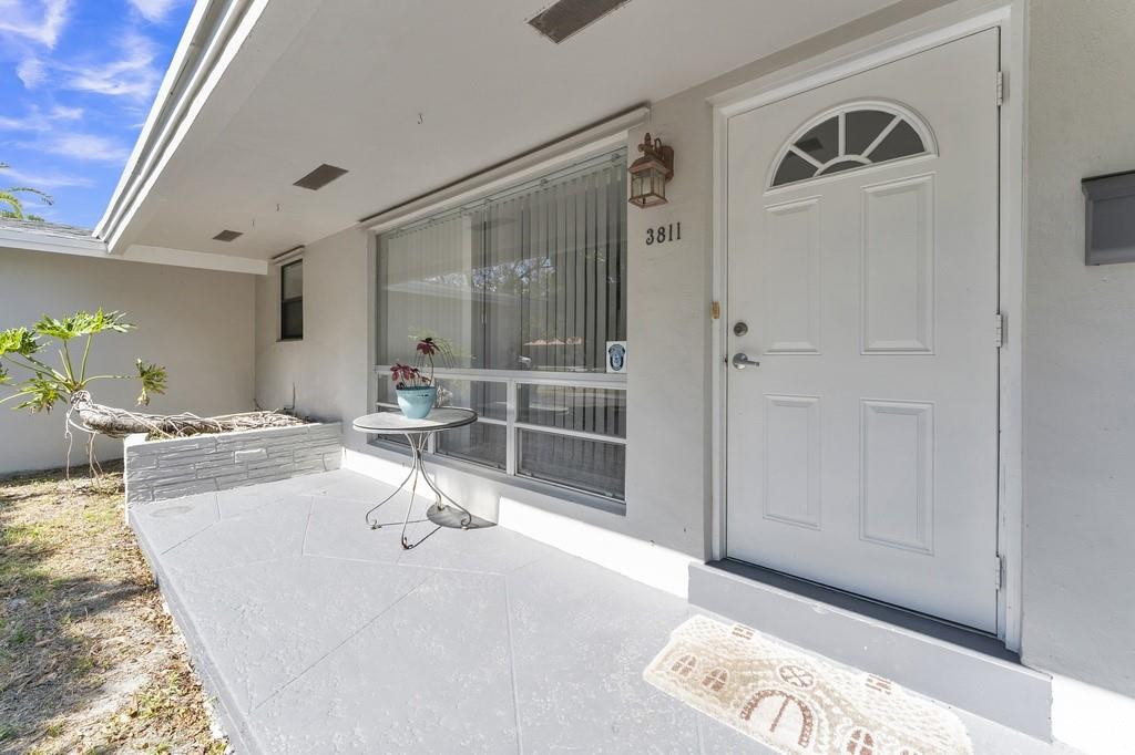 3811 Garfield Street Hollywood, FL 33021 - Photo 2 of 18 a room with sink and mirror