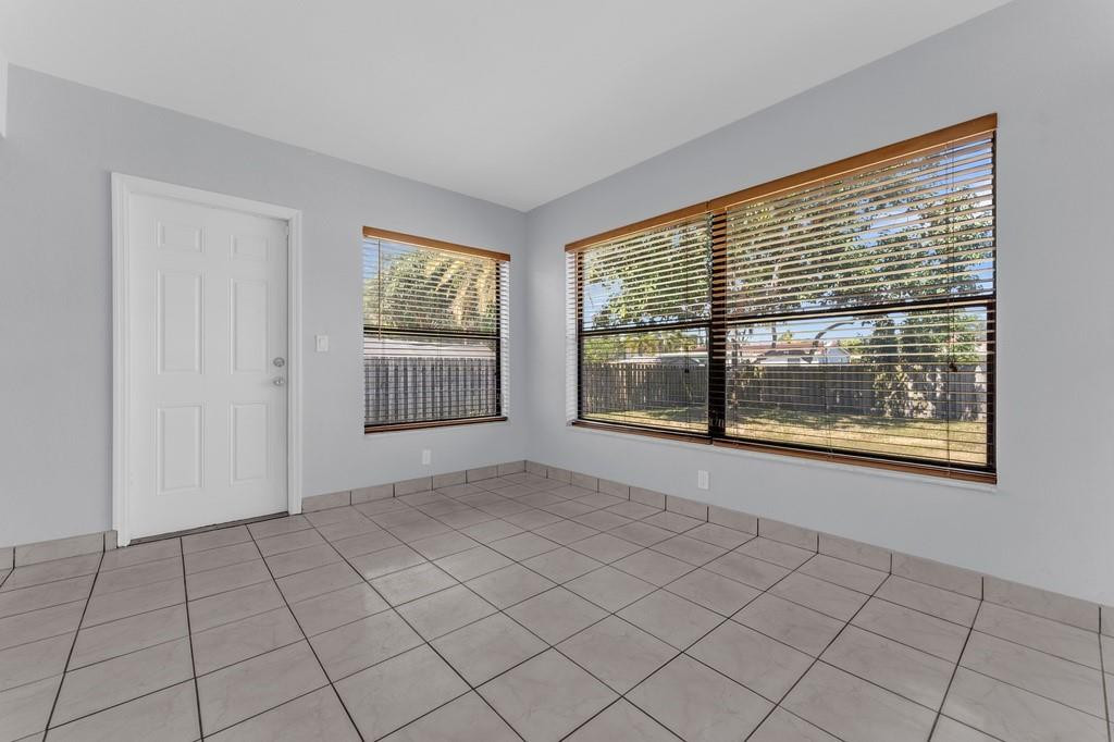 3811 Garfield Street Hollywood, FL 33021 - Photo 9 of 18 a view of an empty room with window