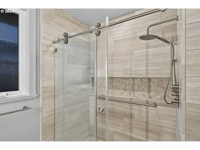 a view of livingroom with washer and dryer