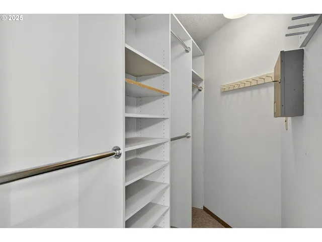 a bathroom with a shower and a sink