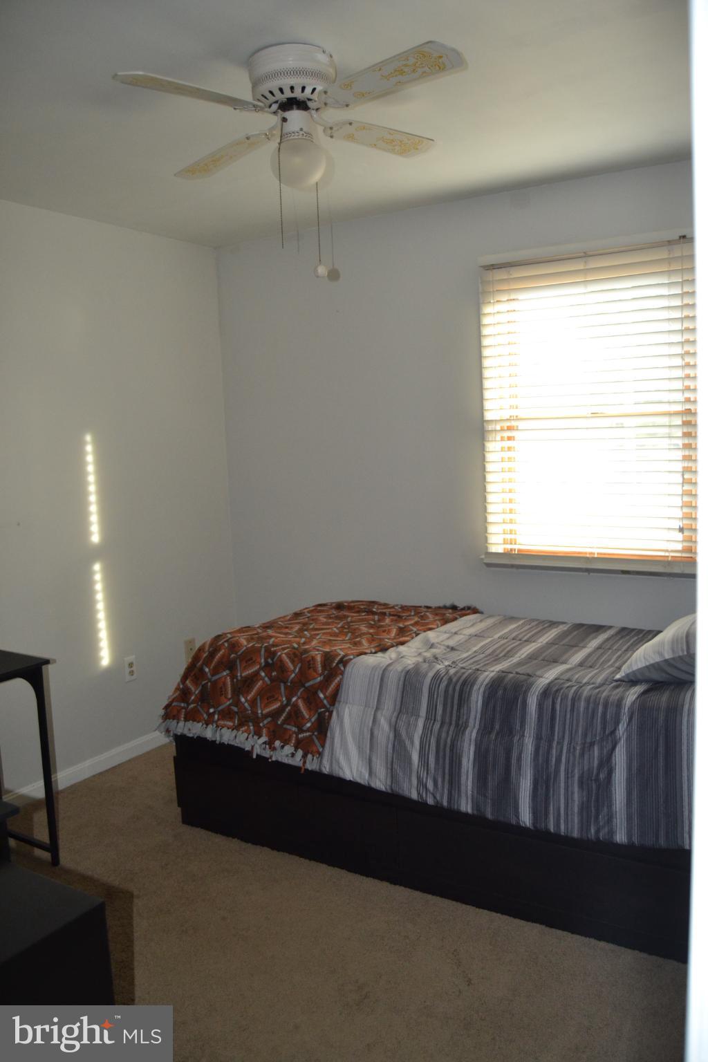 686 State Road West Grove, PA 19390 - Photo 11 of 43 a bedroom with a bed and a night stand