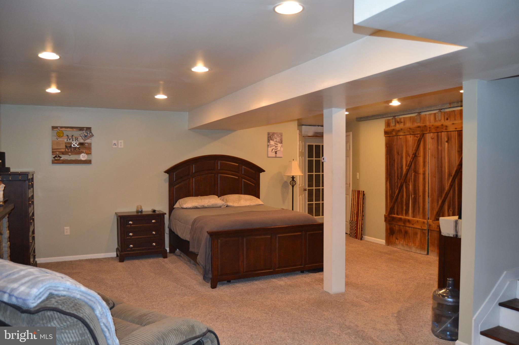 686 State Road West Grove, PA 19390 - Photo 19 of 43 a bedroom with a bed and a cabinets