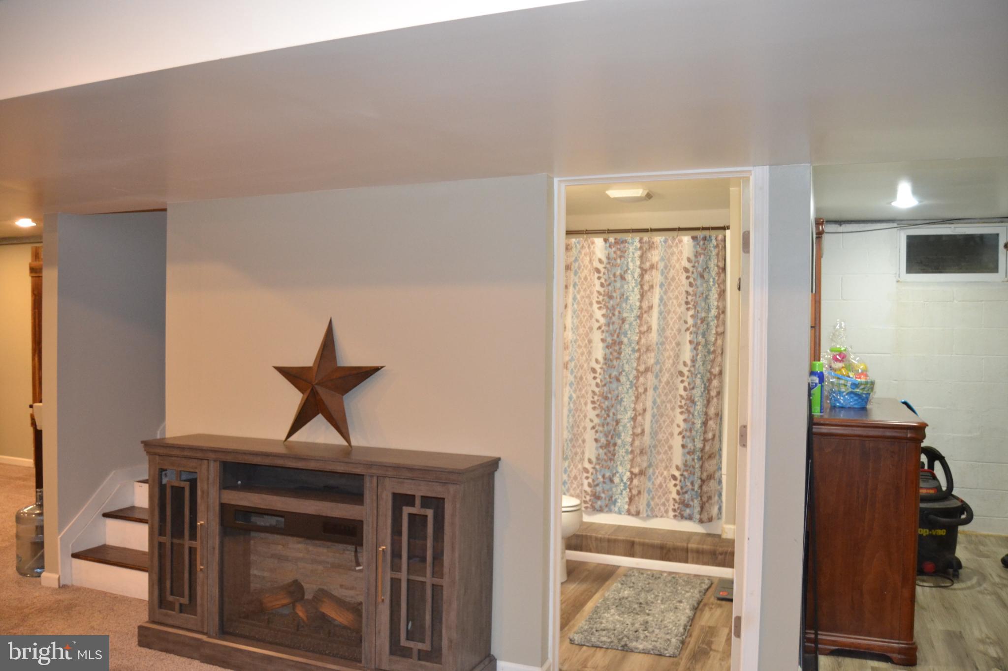 686 State Road West Grove, PA 19390 - Photo 20 of 43 a living room with furniture and a window