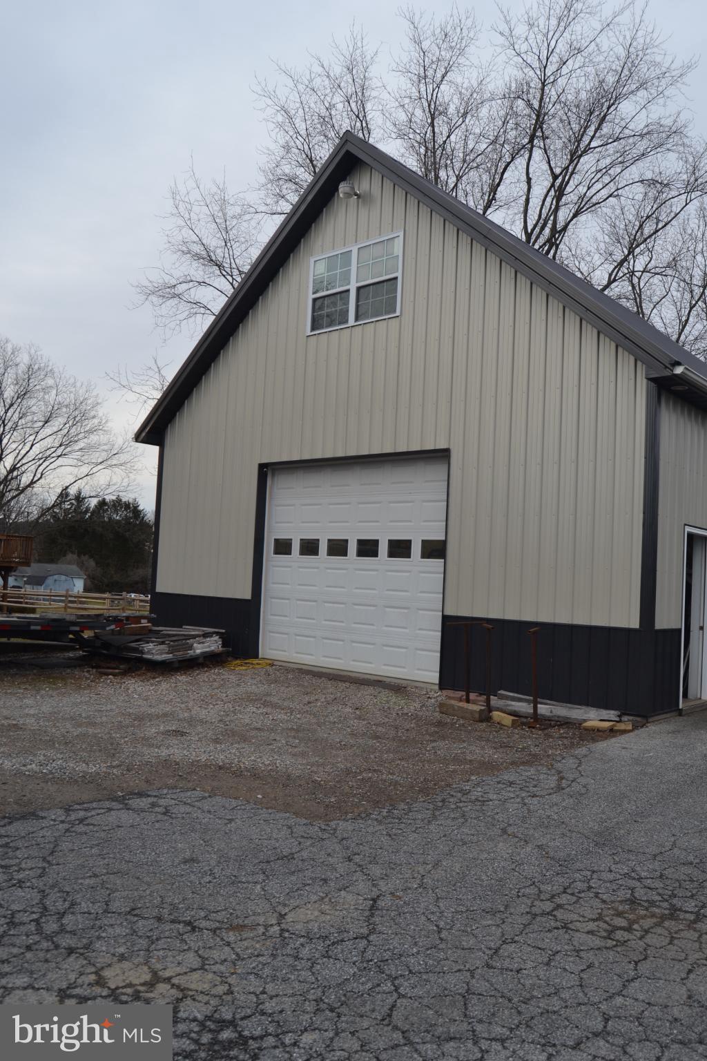686 State Road West Grove, PA 19390 - Photo 2 of 43 a front view of a house with a yard