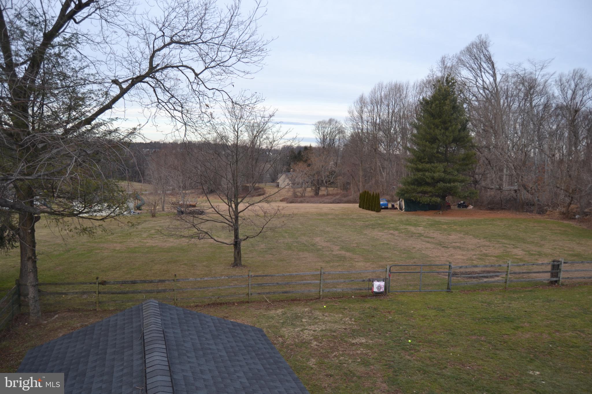 686 State Road West Grove, PA 19390 - Photo 36 of 43 a view of a field of water with a building in the background