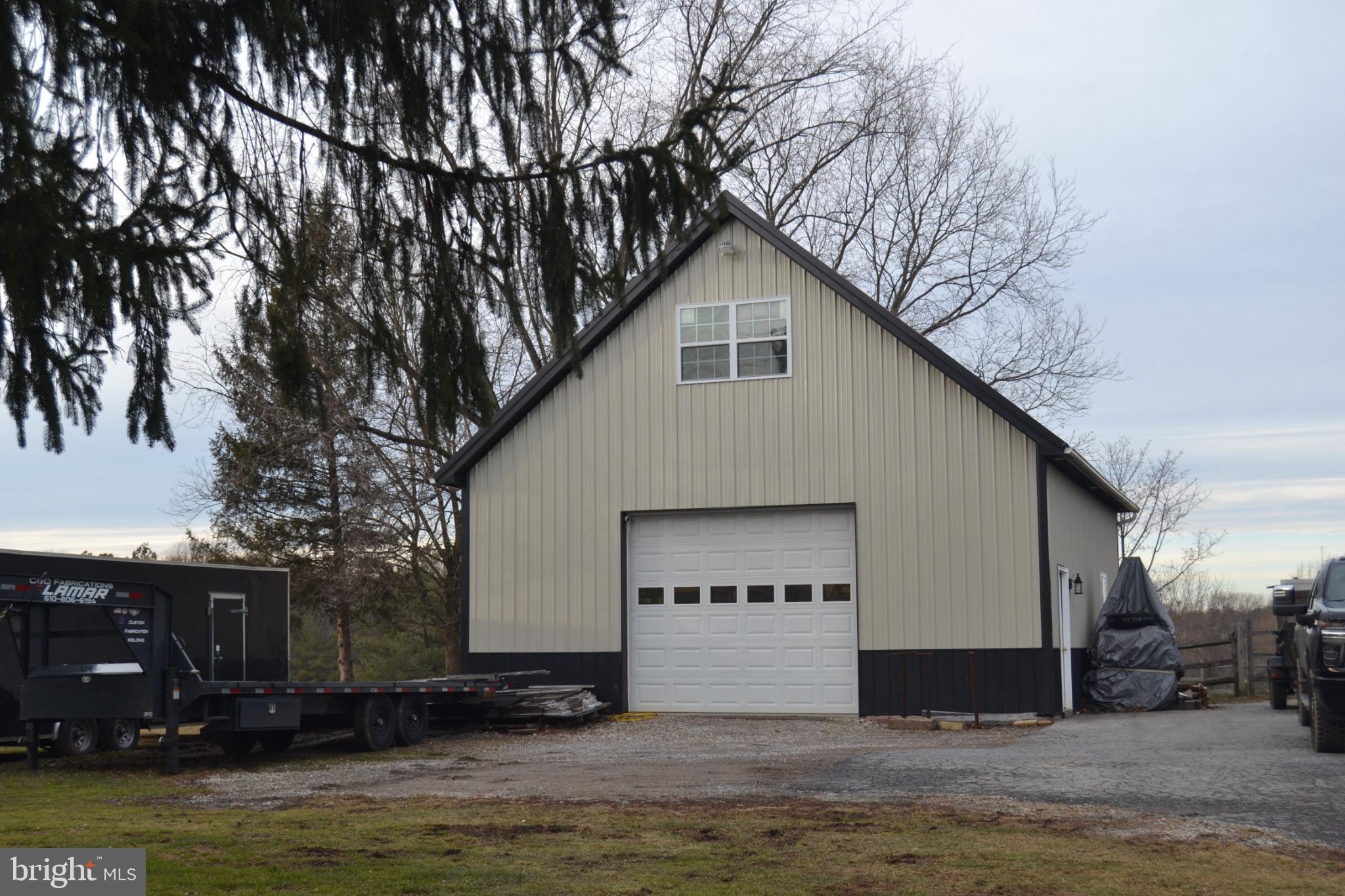 686 State Road West Grove, PA 19390 - Photo 40 of 43 a view of a house with a yard