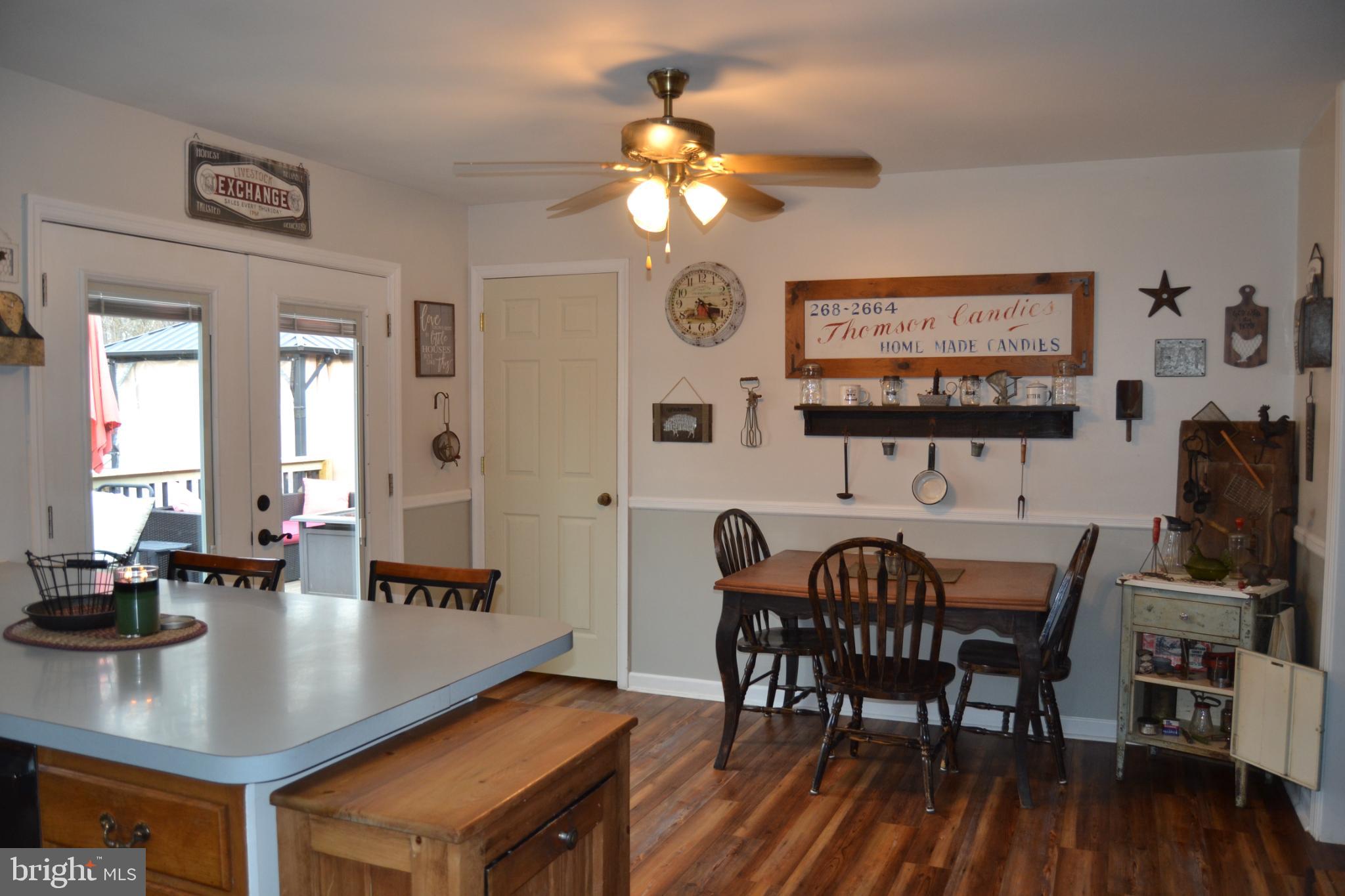 686 State Road West Grove, PA 19390 - Photo 5 of 43 a view of a dining room with furniture and wooden floor