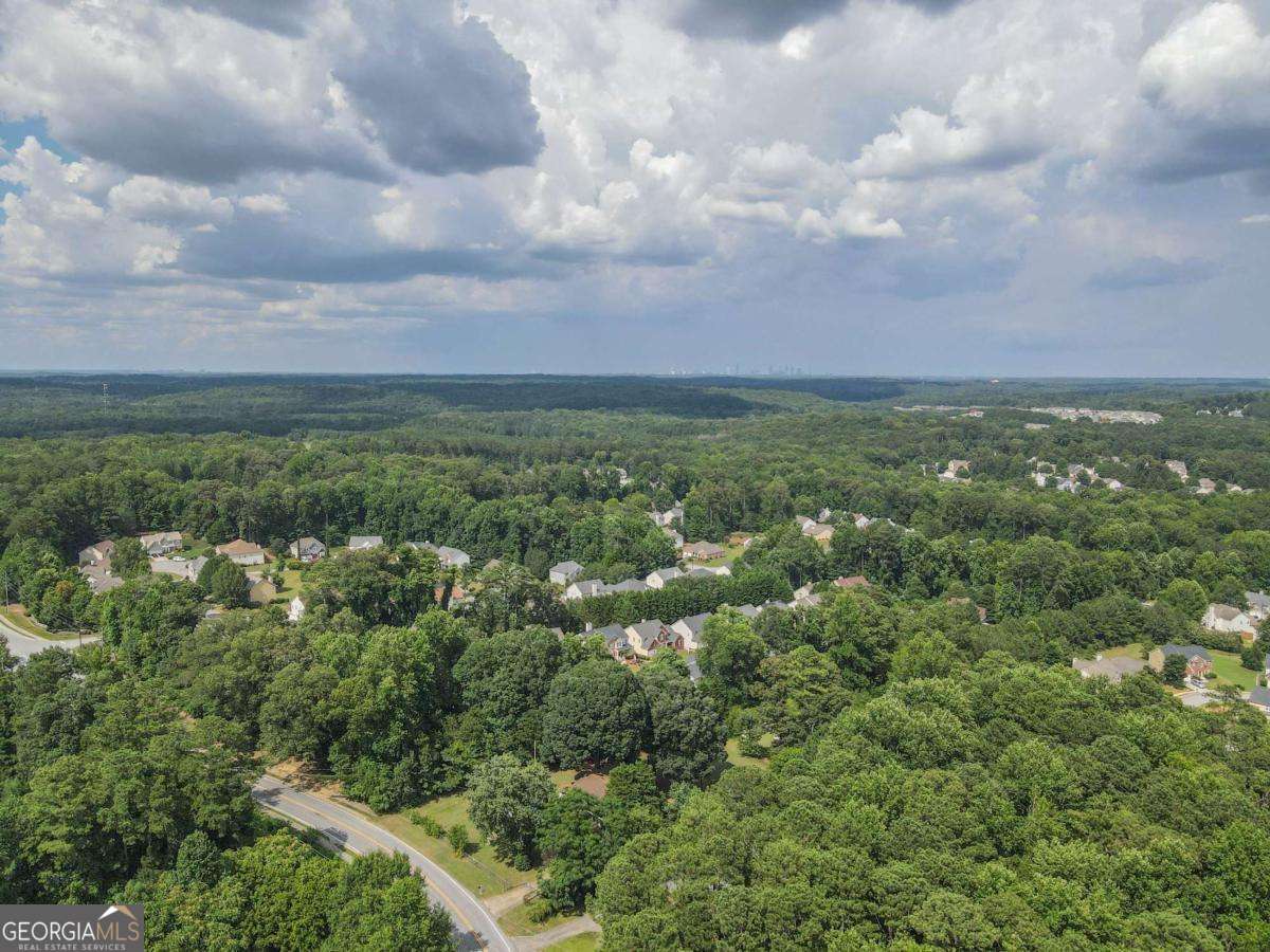 3560 Union Road Southwest Atlanta, GA 30349 - Photo 3 of 7 a view of a city with lush green forest