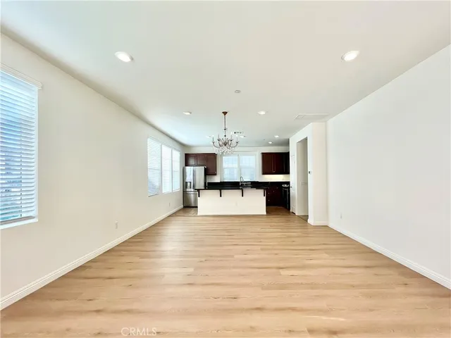 a view of a kitchen with a sink and a microwave