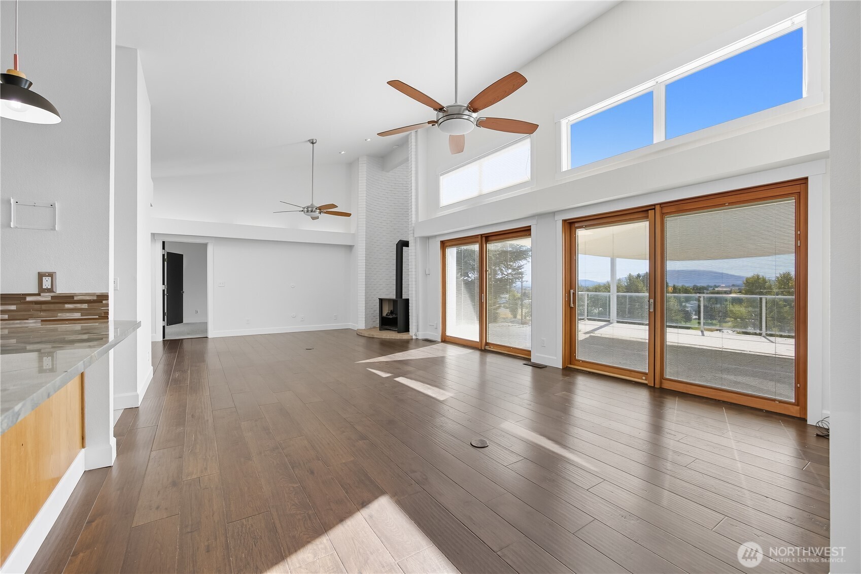 5404 Collins Road West Richland, WA 99353 - Photo 12 of 39 a view of empty room with wooden floor and fan