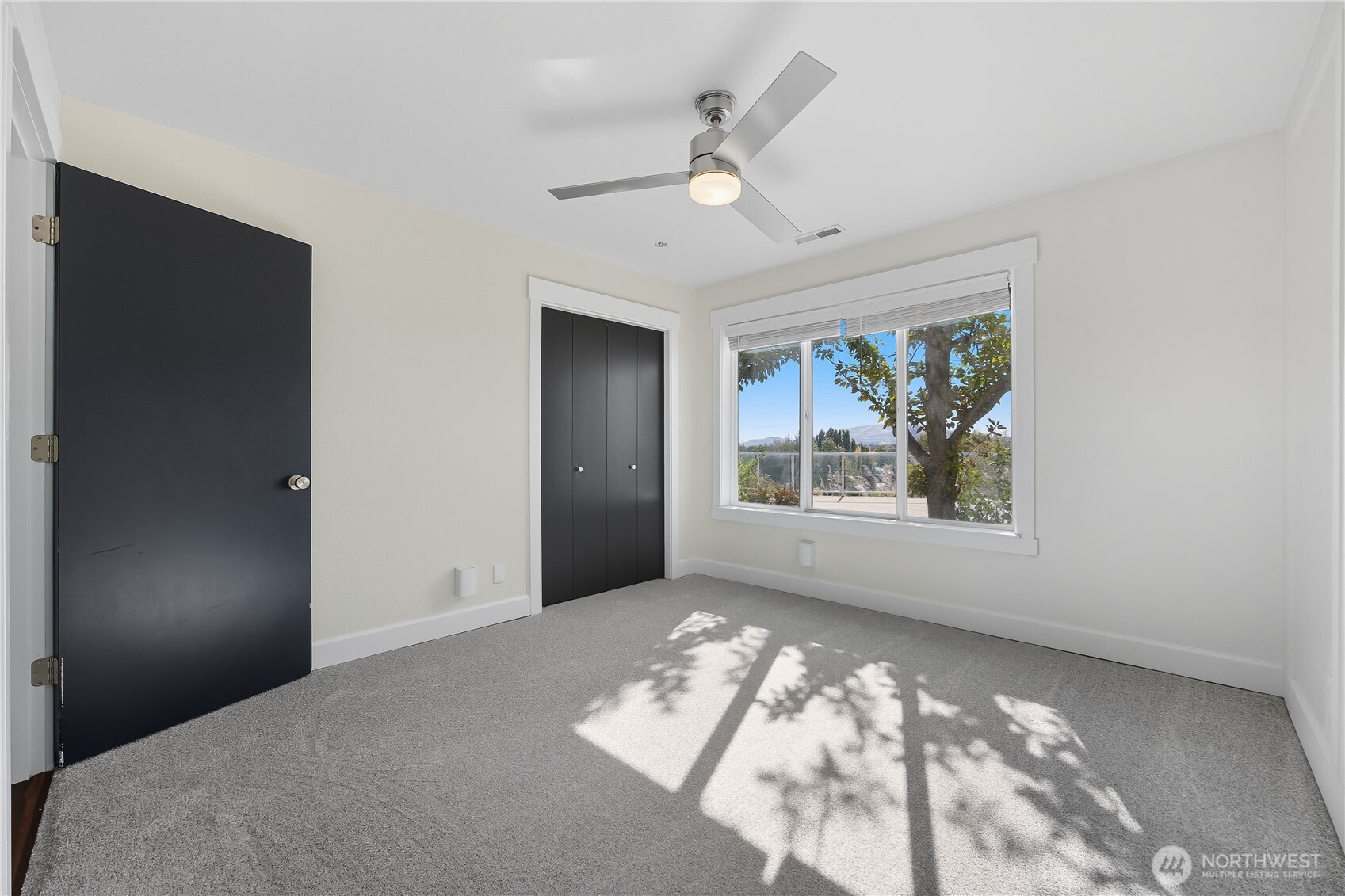 5404 Collins Road West Richland, WA 99353 - Photo 22 of 39 a view of an empty room with a window