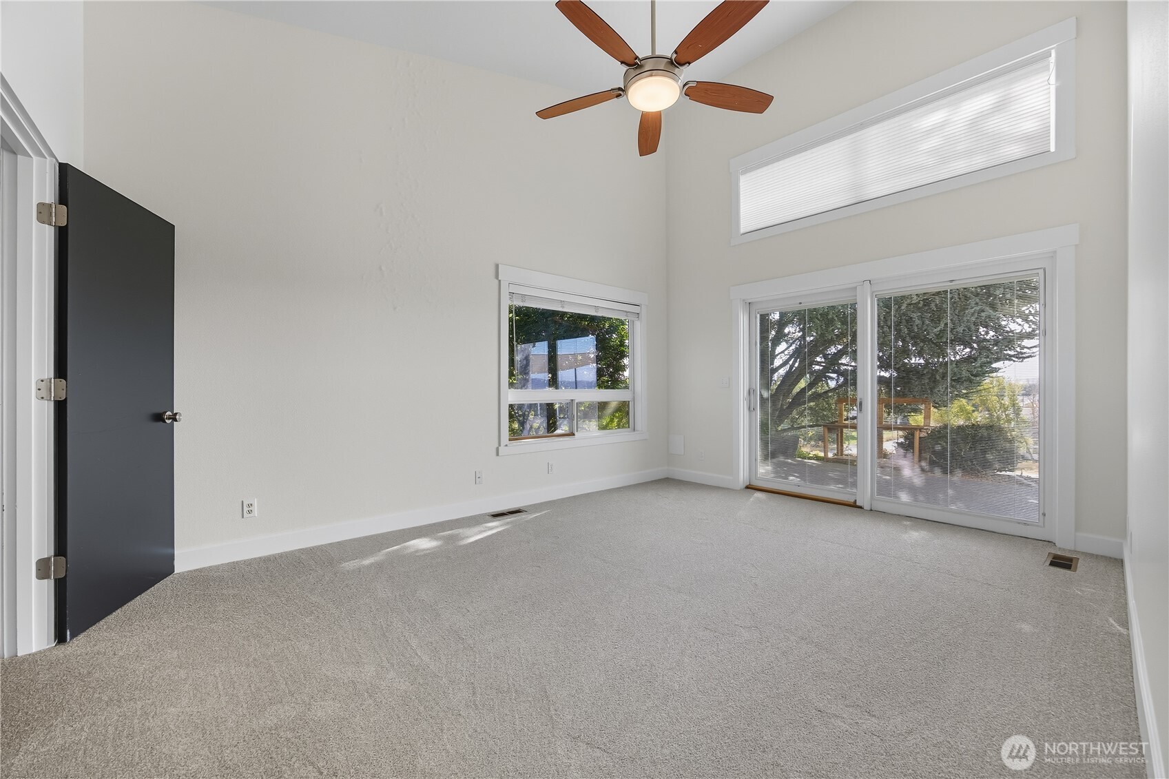 5404 Collins Road West Richland, WA 99353 - Photo 25 of 39 wooden floor in an empty room with a window