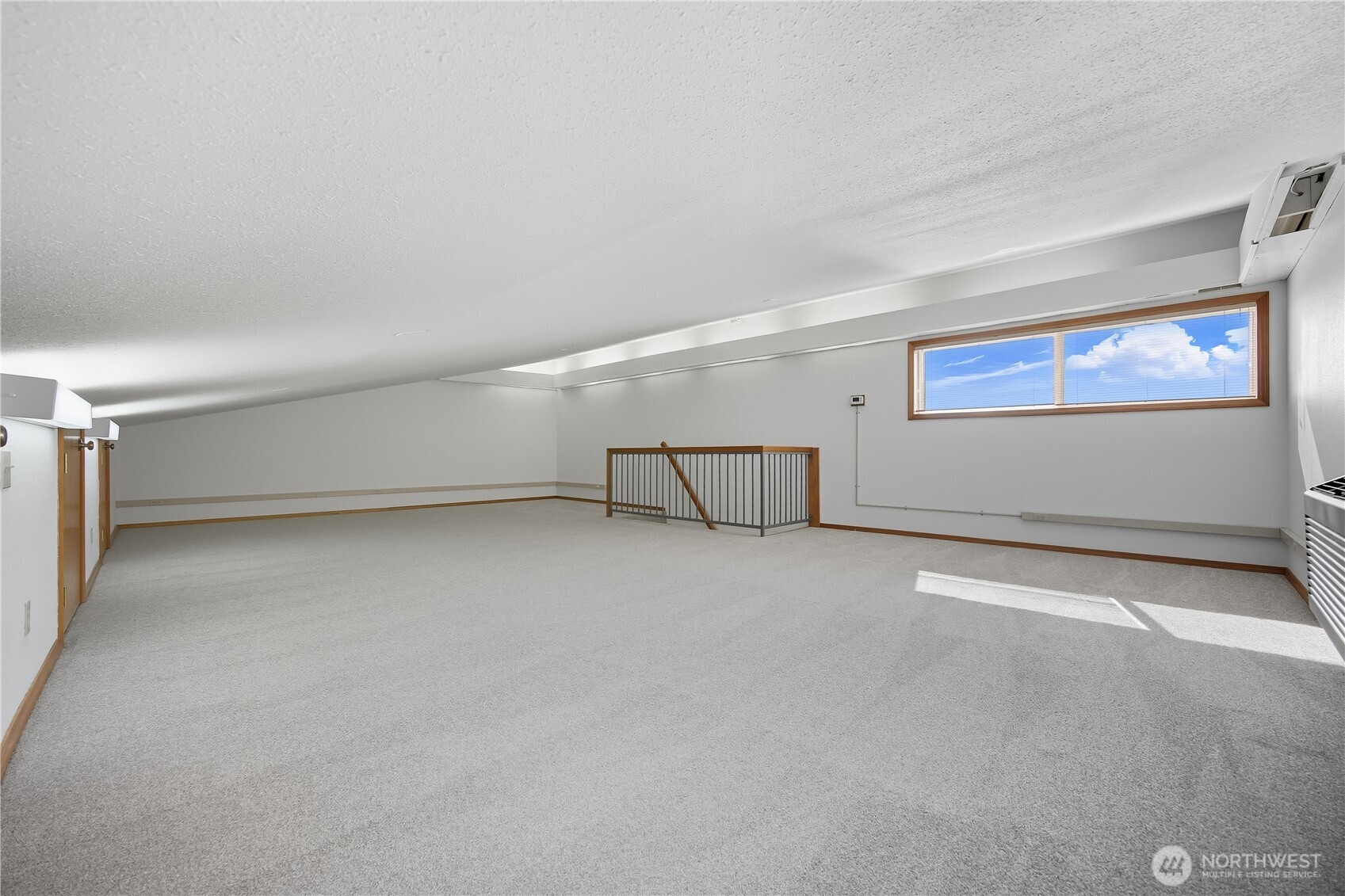 5404 Collins Road West Richland, WA 99353 - Photo 28 of 39 a view of an empty room with a window