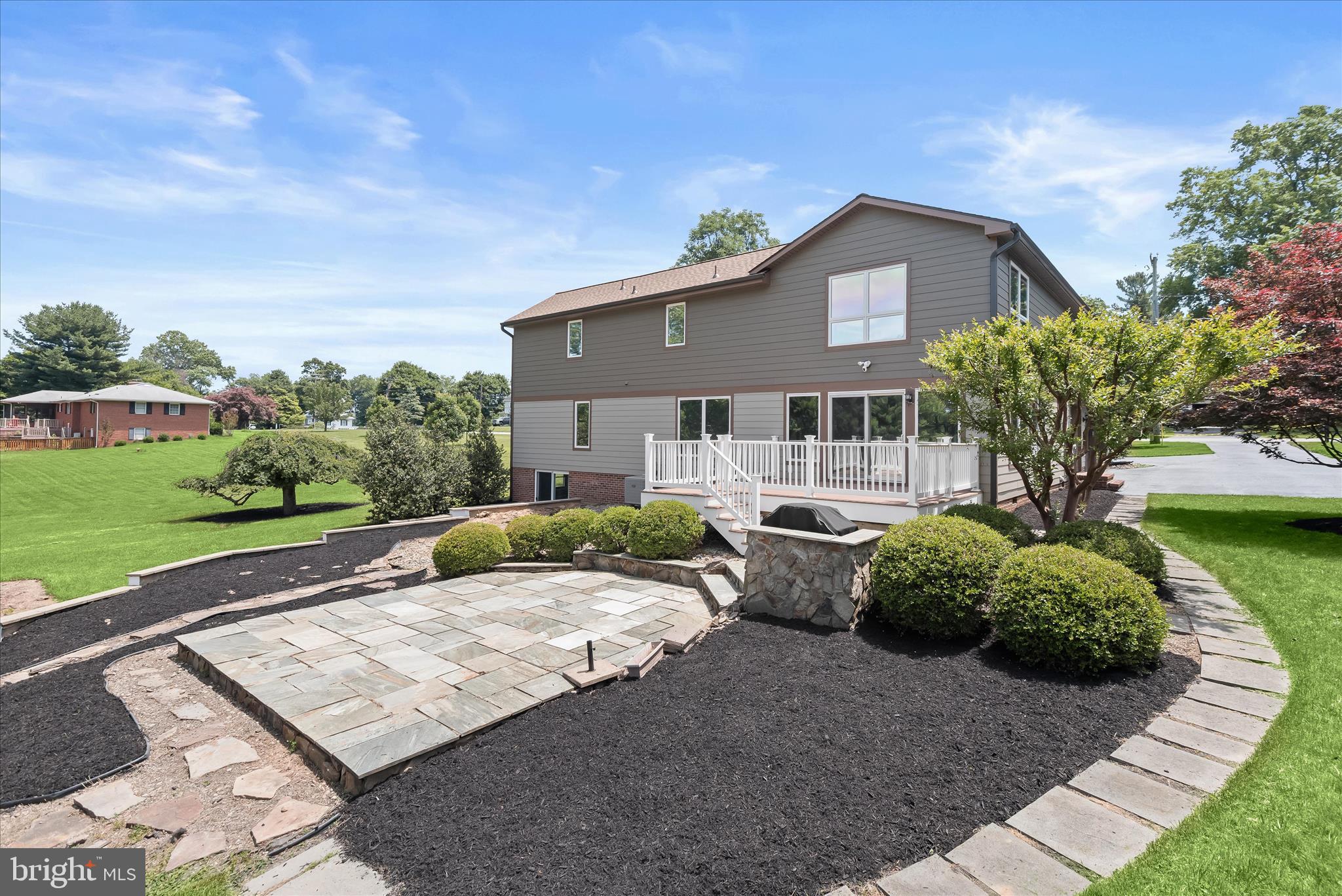 13356 Triadelphia Road Ellicott City, MD 21042 - Photo 57 of 73 Rear Patio & Garden Beds