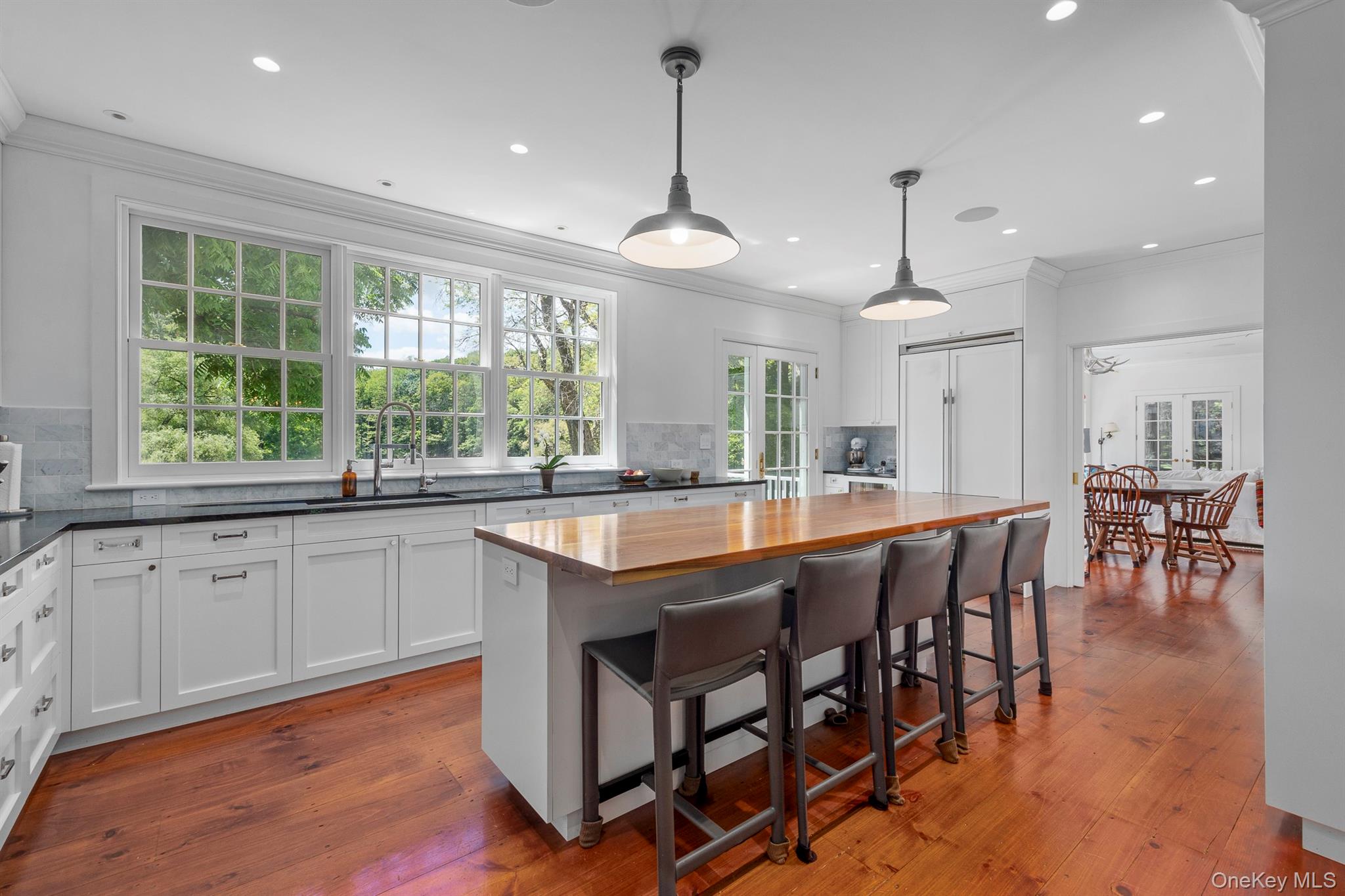176 Schoolhouse Road Staatsburg, NY 12580 - Photo 11 of 37 a large kitchen with kitchen island a large island in it