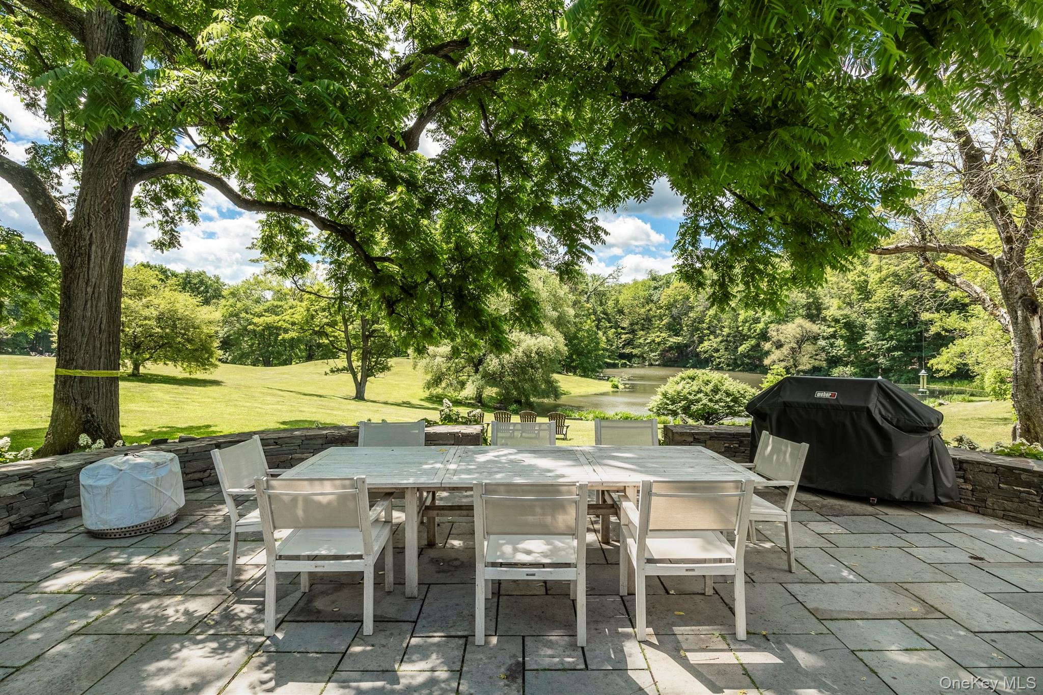 176 Schoolhouse Road Staatsburg, NY 12580 - Photo 17 of 37 a view of a chairs and table in the patio
