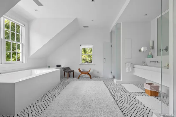 a bedroom with a bed and a table in it