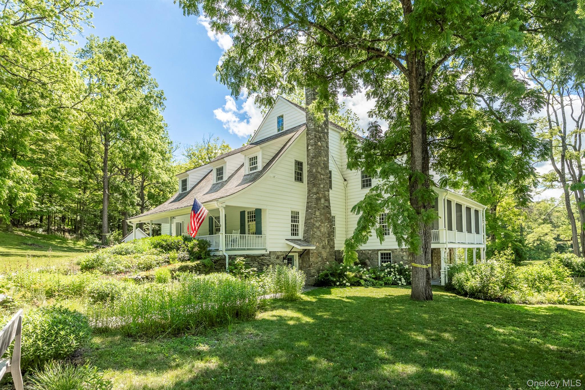 176 Schoolhouse Road Staatsburg, NY 12580 - Photo 4 of 37 a house with a tree in front of it