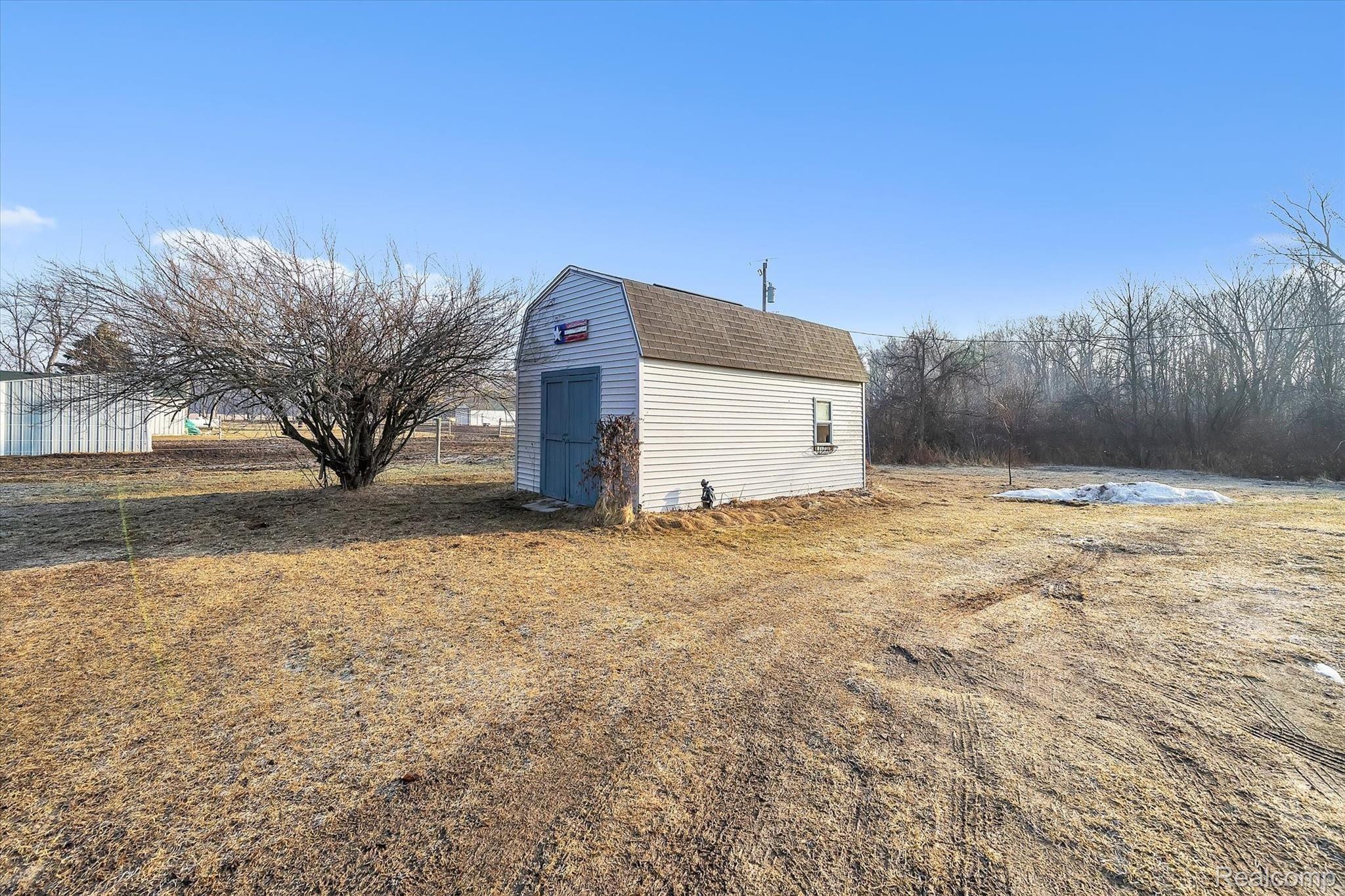 10928 North Nicholson Road Fowlerville, MI 48836 - Photo 24 of 32 Garden Shed