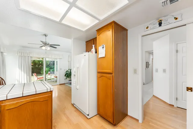 a view of a livingroom with furniture and a window