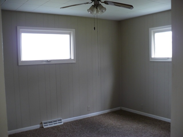 627 South 2nd Street Rochelle, IL 61068 - Photo 8 of 19 an empty room with a window
