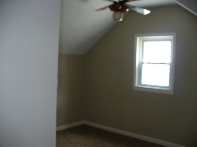 627 South 2nd Street Rochelle, IL 61068 - Photo 10 of 19 an empty room with a window