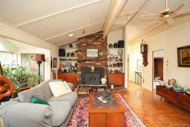 a view of a patio with a table and chairs