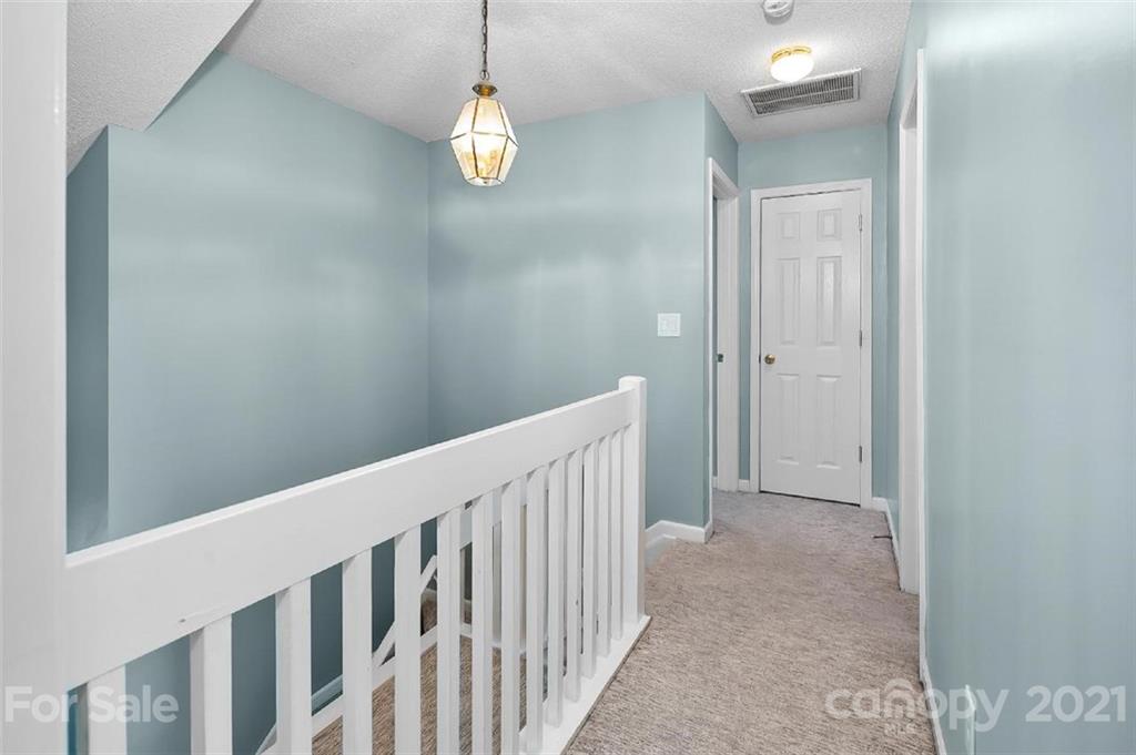 10930 Kinston Ridge Place, Unit 1237 Charlotte, NC 28273 - Photo 13 of 32 a view of a hallway view