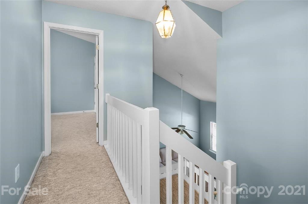 10930 Kinston Ridge Place, Unit 1237 Charlotte, NC 28273 - Photo 16 of 32 a view of a hallway view with staircase