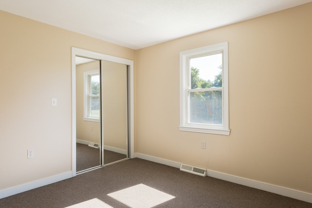 12 Gibbs Road Middleboro, MA 02346 - Photo 31 of 38 an empty room with windows and closet