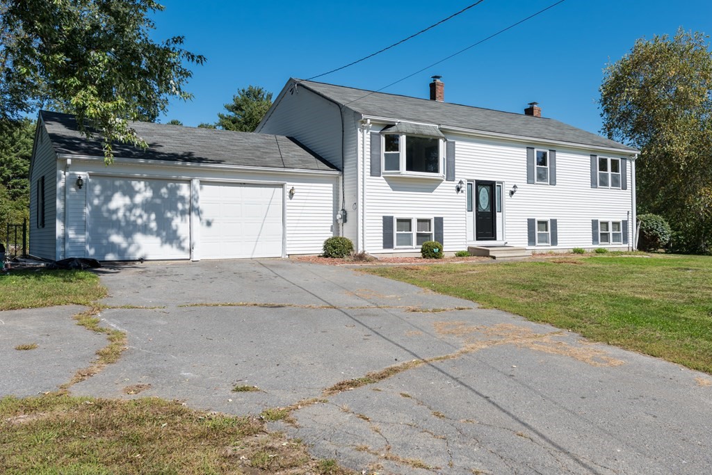12 Gibbs Road Middleboro, MA 02346 - Photo 5 of 38 a front view of a house with a yard