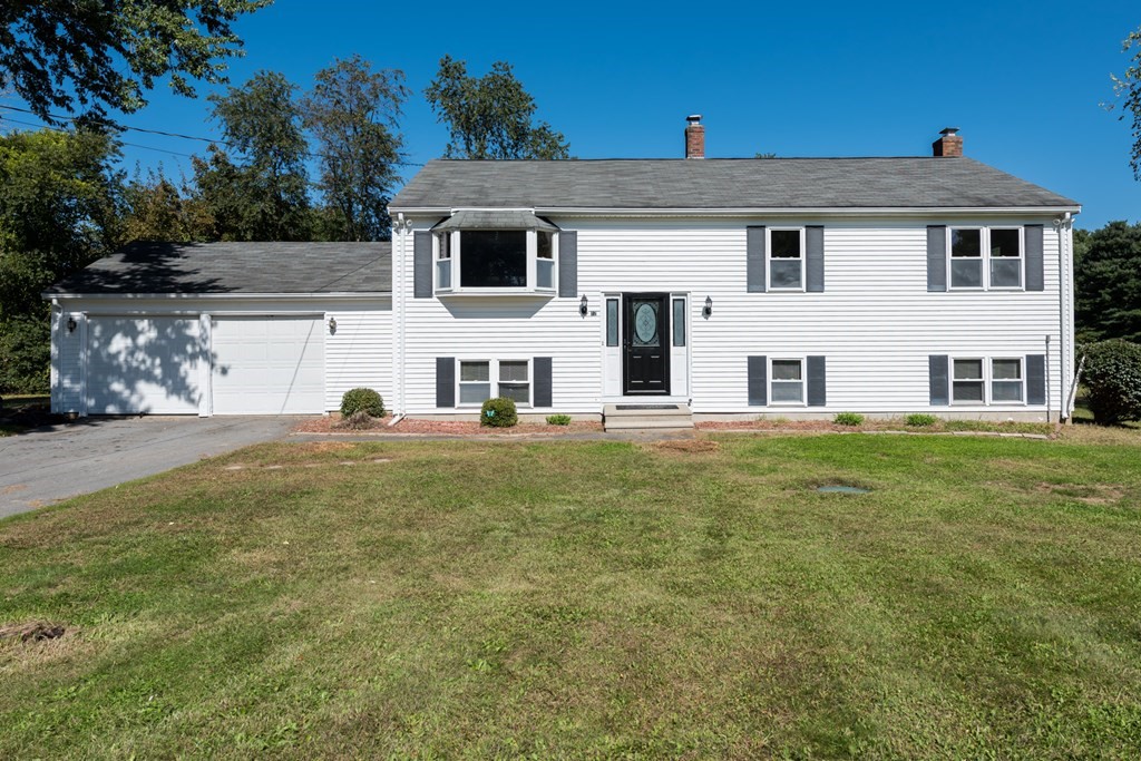 12 Gibbs Road Middleboro, MA 02346 - Photo 6 of 38 a view of a house with a backyard