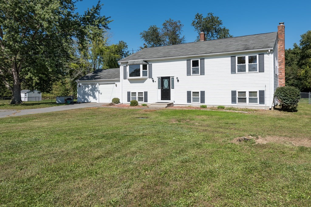 12 Gibbs Road Middleboro, MA 02346 - Photo 7 of 38 a big white house with a big yard and large trees