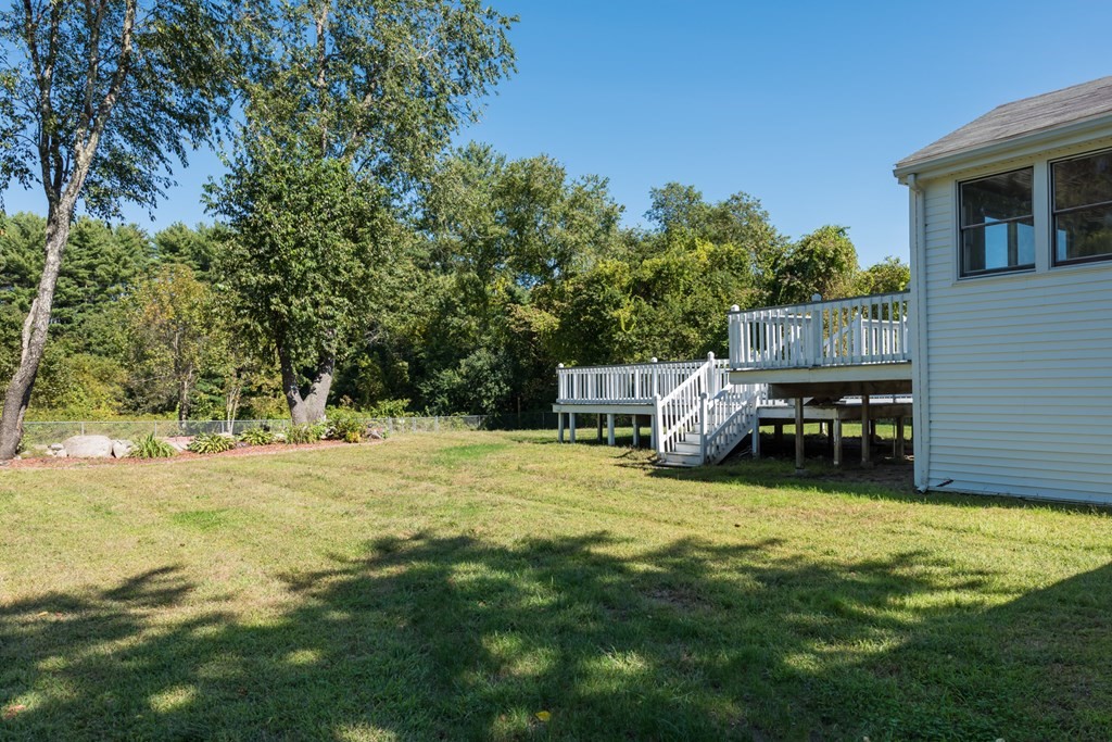 12 Gibbs Road Middleboro, MA 02346 - Photo 8 of 38 a view of a house with backyard and porch