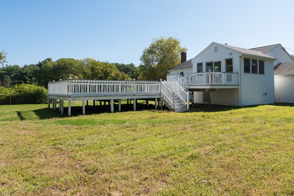 12 Gibbs Road Middleboro, MA 02346 - Photo 9 of 38 a front view of a house with a yard