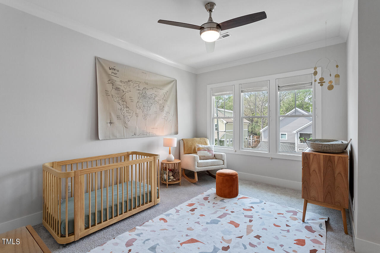 638 Watauga Street Raleigh, NC 27604 - Photo 23 of 41 a bedroom with furniture and a window