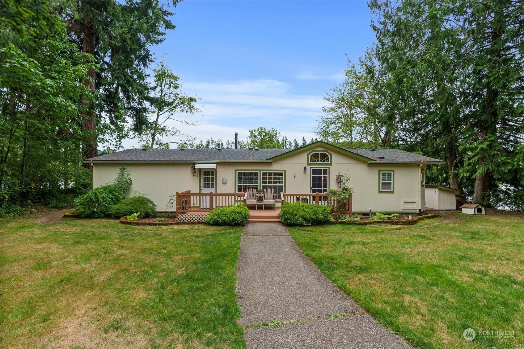 14940 Military Road Southeast Tenino, WA 98589 - Photo 2 of 30 a front view of house with yard and green space