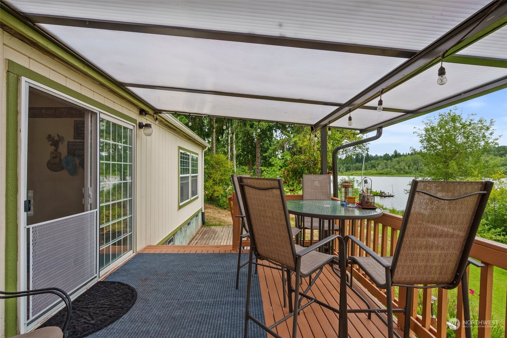 14940 Military Road Southeast Tenino, WA 98589 - Photo 22 of 30 a view of a porch with furniture and wooden floor