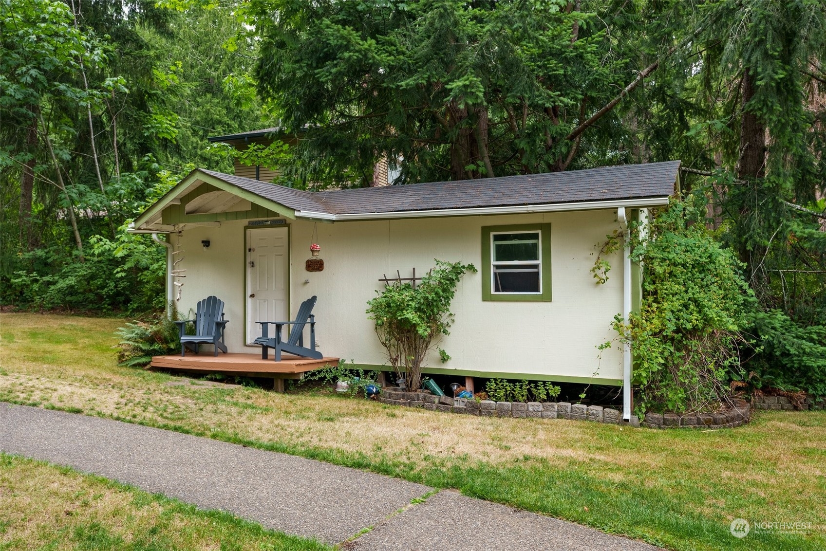 14940 Military Road Southeast Tenino, WA 98589 - Photo 24 of 30 a front view of a house with garden