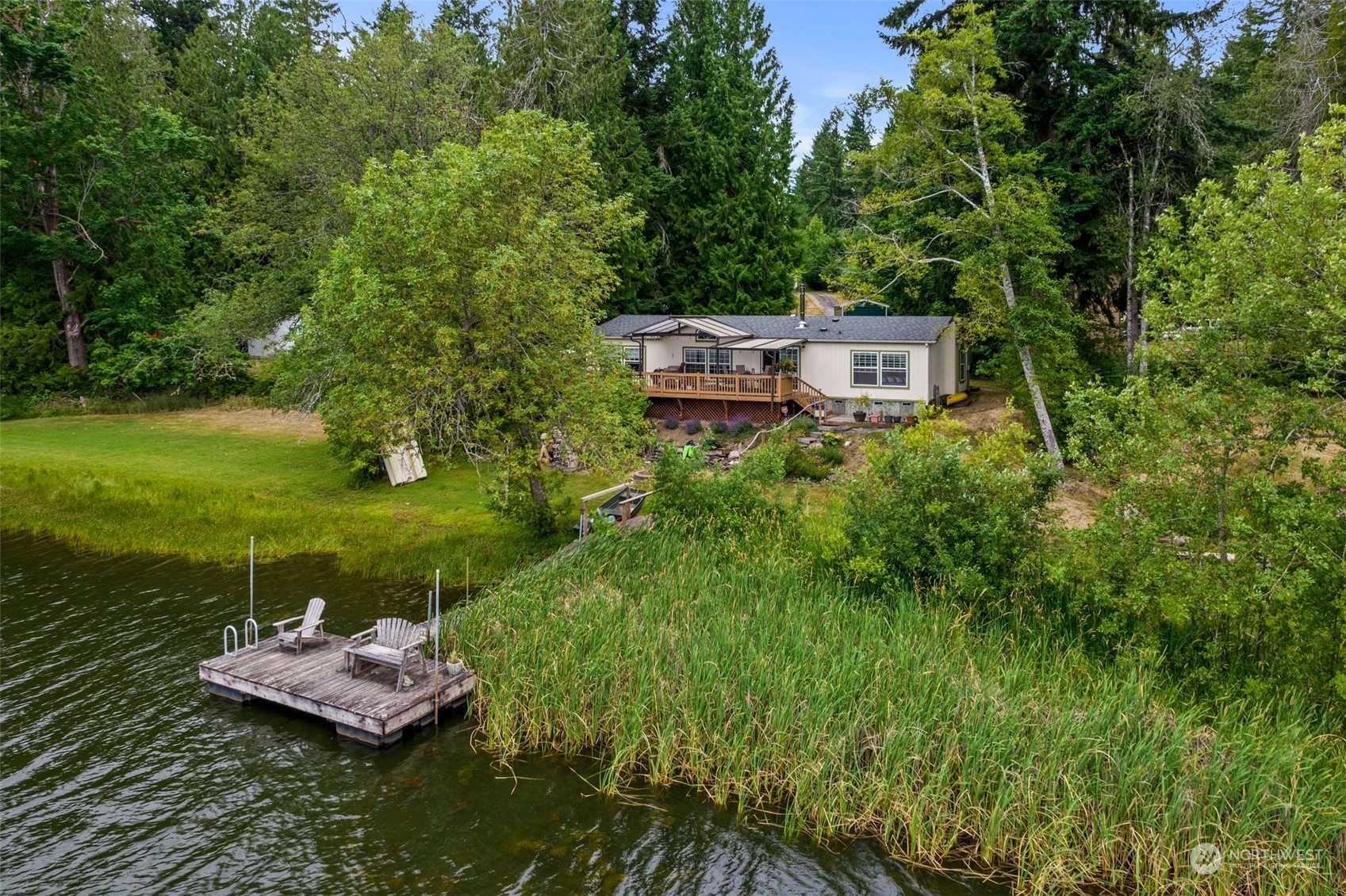 14940 Military Road Southeast Tenino, WA 98589 - Photo 27 of 30 a view of a garden with a bench