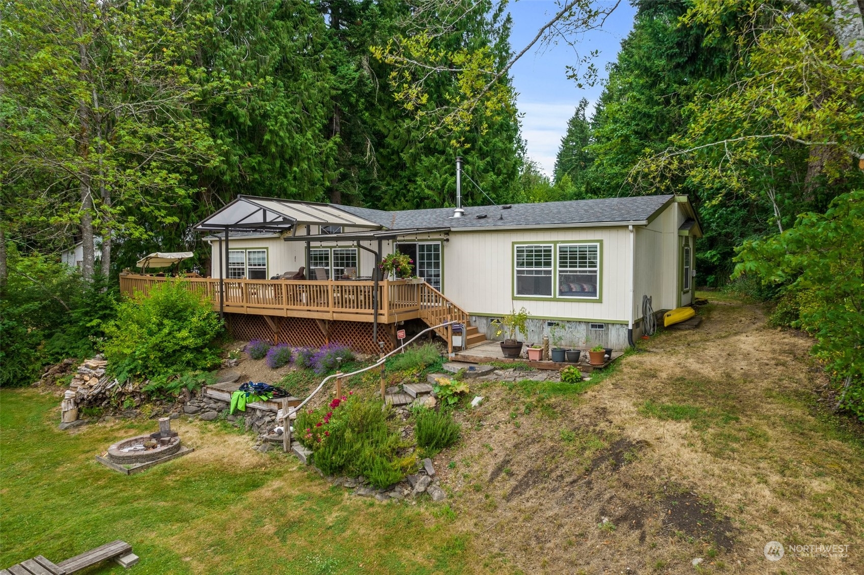 14940 Military Road Southeast Tenino, WA 98589 - Photo 28 of 30 an aerial view of a house with yard and trees in the background