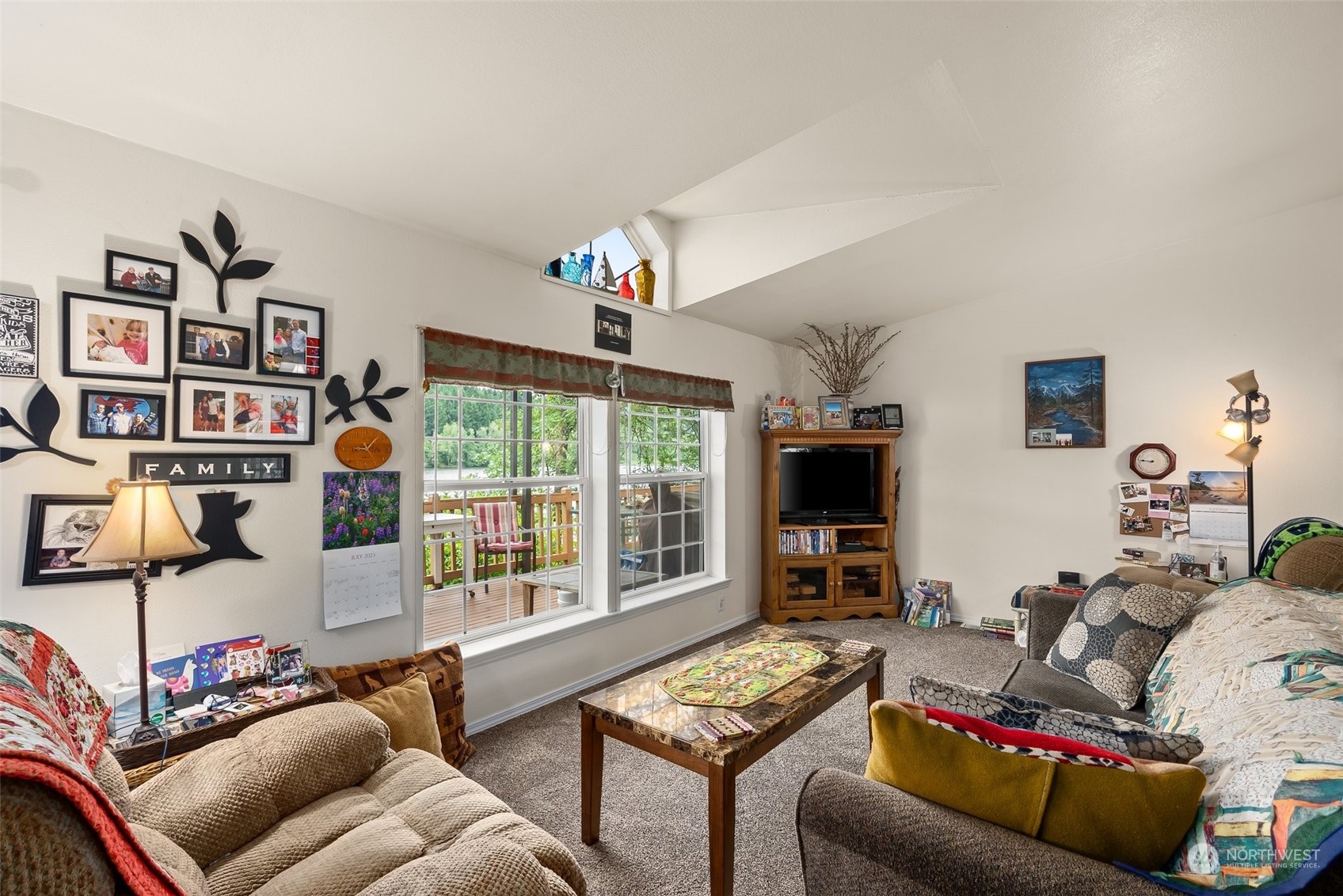 14940 Military Road Southeast Tenino, WA 98589 - Photo 5 of 30 a living room with furniture and a flat screen tv