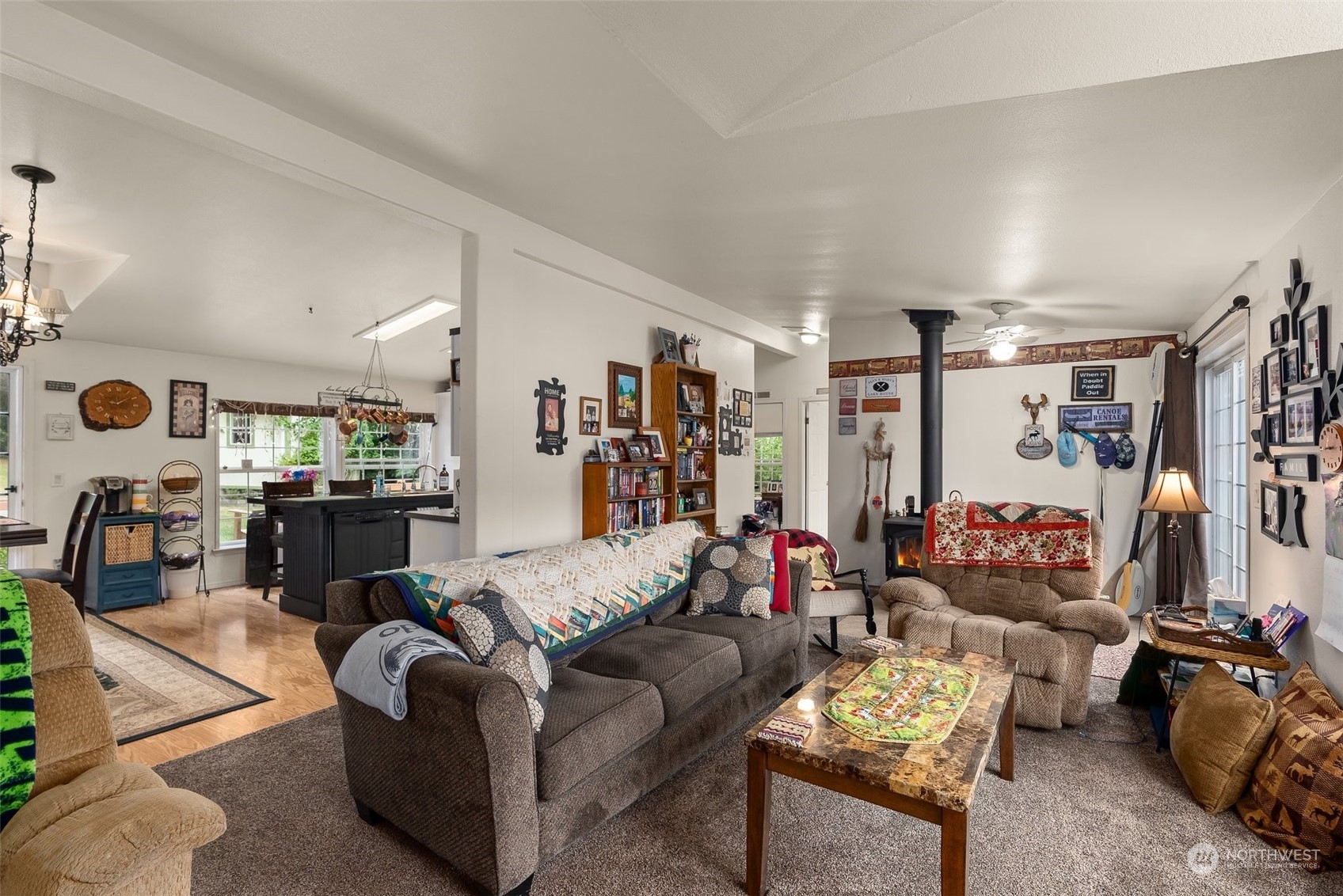 14940 Military Road Southeast Tenino, WA 98589 - Photo 6 of 30 a living room with furniture and a flat screen tv