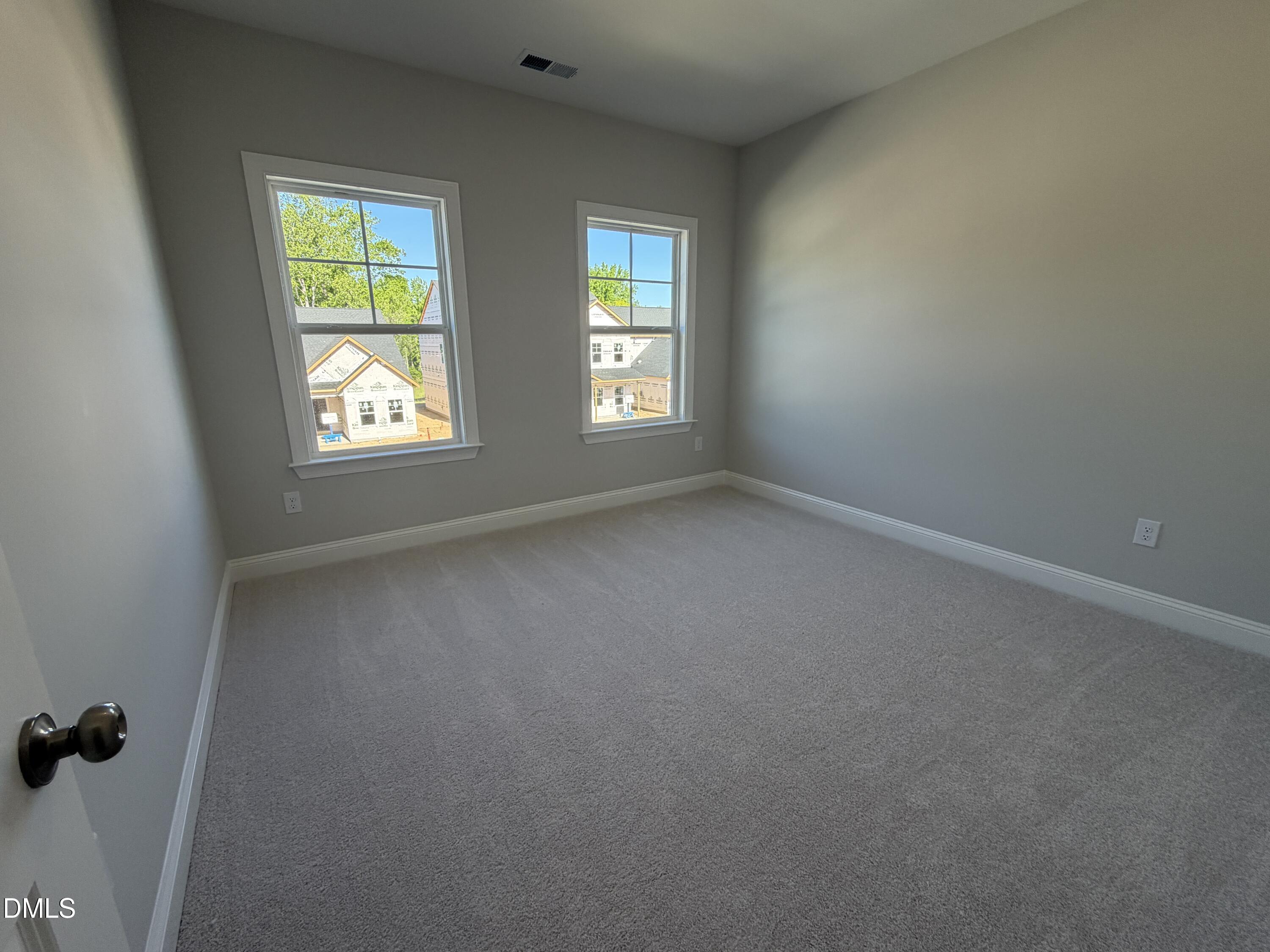 3016 Sandy Bluff Road Raleigh, NC 27616 - Photo 30 of 34 an empty room with windows