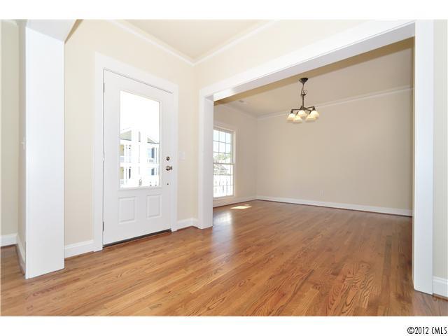 3426 Richard's Crossing Fort Mill, SC 29708 - Photo 4 of 16 a view of an empty room with wooden floor