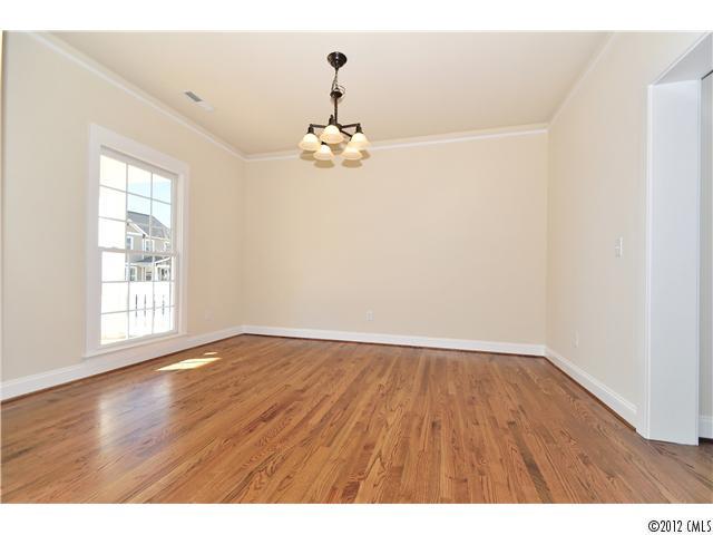 3426 Richard's Crossing Fort Mill, SC 29708 - Photo 5 of 16 wooden floor in an empty room with a window