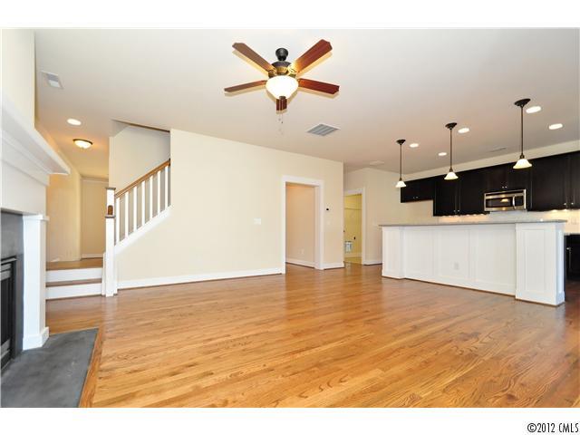 3426 Richard's Crossing Fort Mill, SC 29708 - Photo 8 of 16 a view of a kitchen with furniture and wooden floor